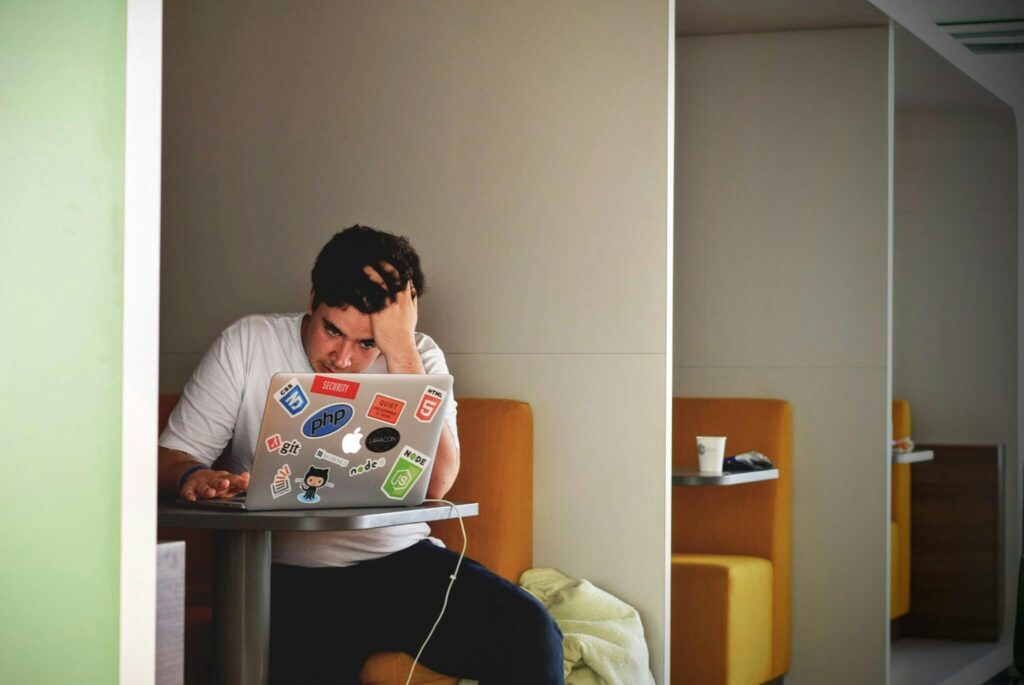 Stressed out developer on a laptop